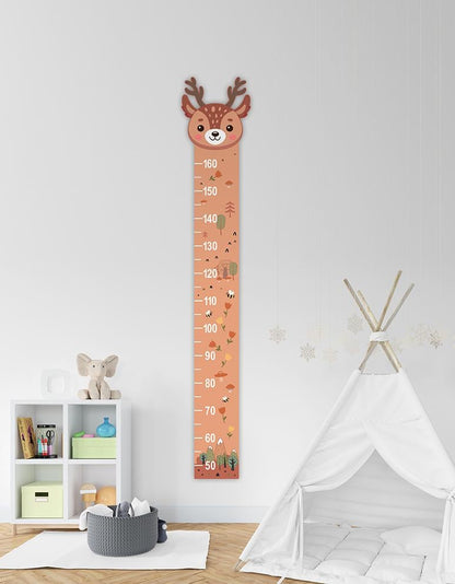 a child's room with a deer growth chart